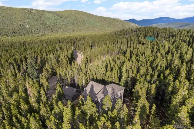 a view of a mountain with an outdoor space