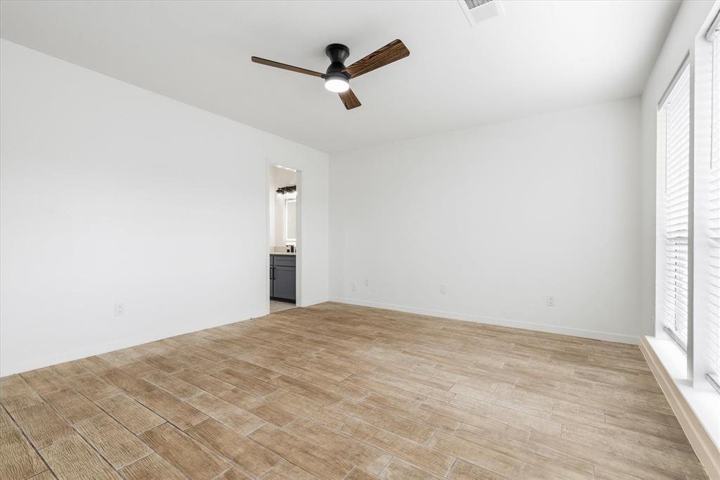 17003 Davenport Road Dallas, TX 75248 - Photo 31 of 40 a view of empty room with ceiling fan