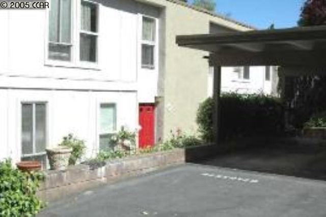 651 Moraga Road, Unit 35 Moraga, CA 94556 - Photo 1 of 1 a front view of a house with a yard
