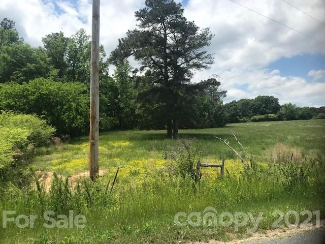 2 Arant Road Monroe, NC 28112 - Photo 2 of 8 a view of a lake view with a garden