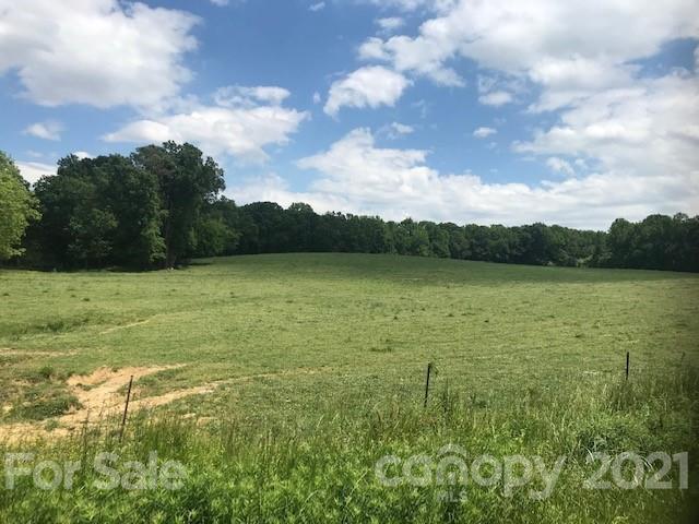 2 Arant Road Monroe, NC 28112 - Photo 5 of 8 a view of a lake with a yard