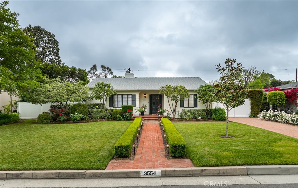 3554 Yorkshire Road Pasadena, CA 91107 - Photo 1 of 1 a front view of house with yard and green space