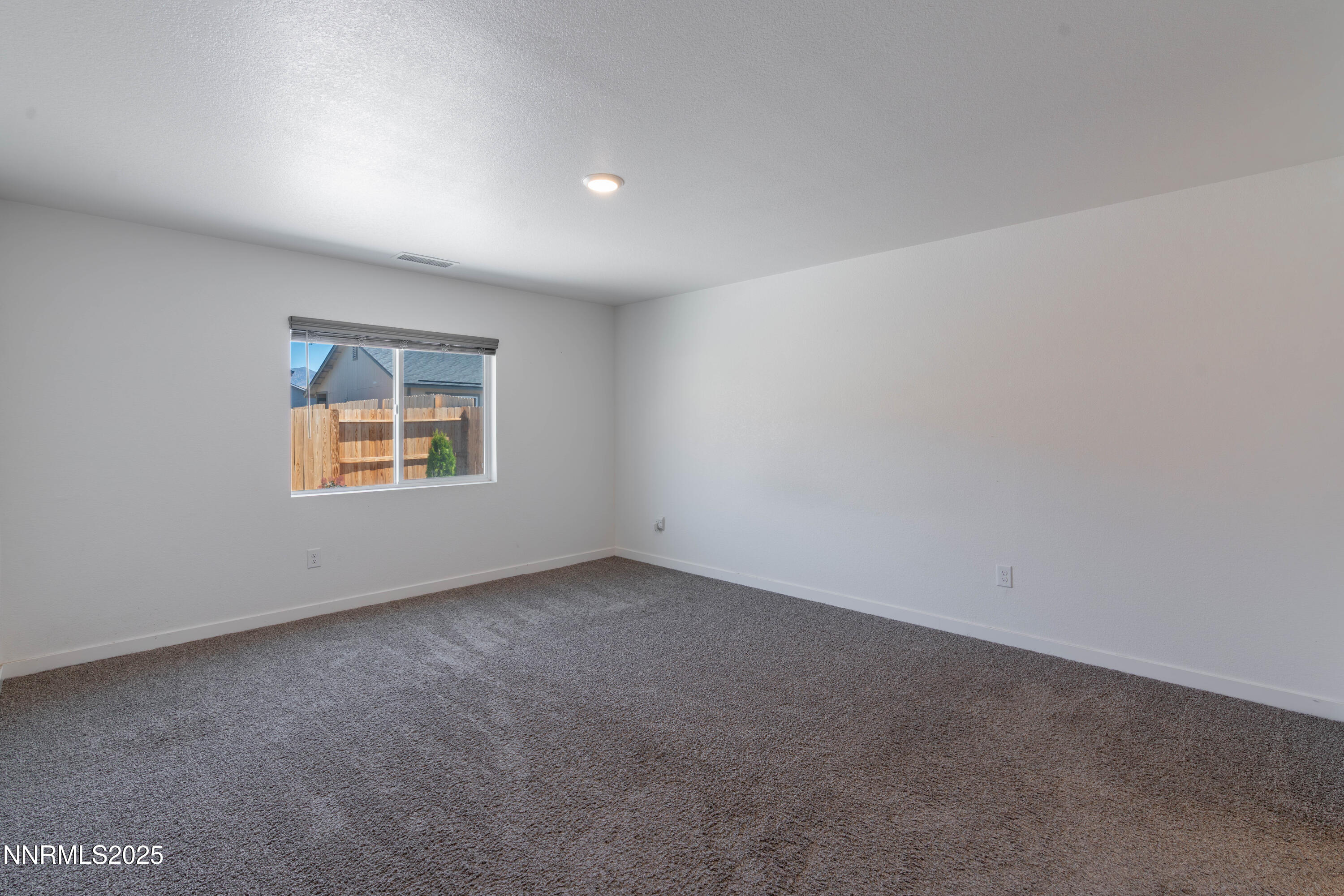 102 Halite Drive Dayton, NV 89403 - Photo 12 of 34 an empty room with a empty space and window
