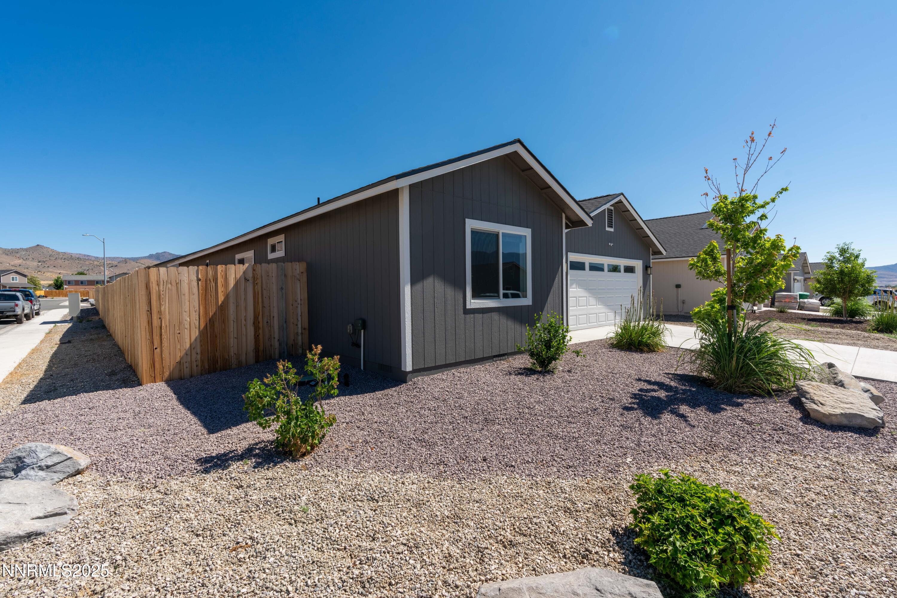 102 Halite Drive Dayton, NV 89403 - Photo 32 of 34 a front view of a house with garden