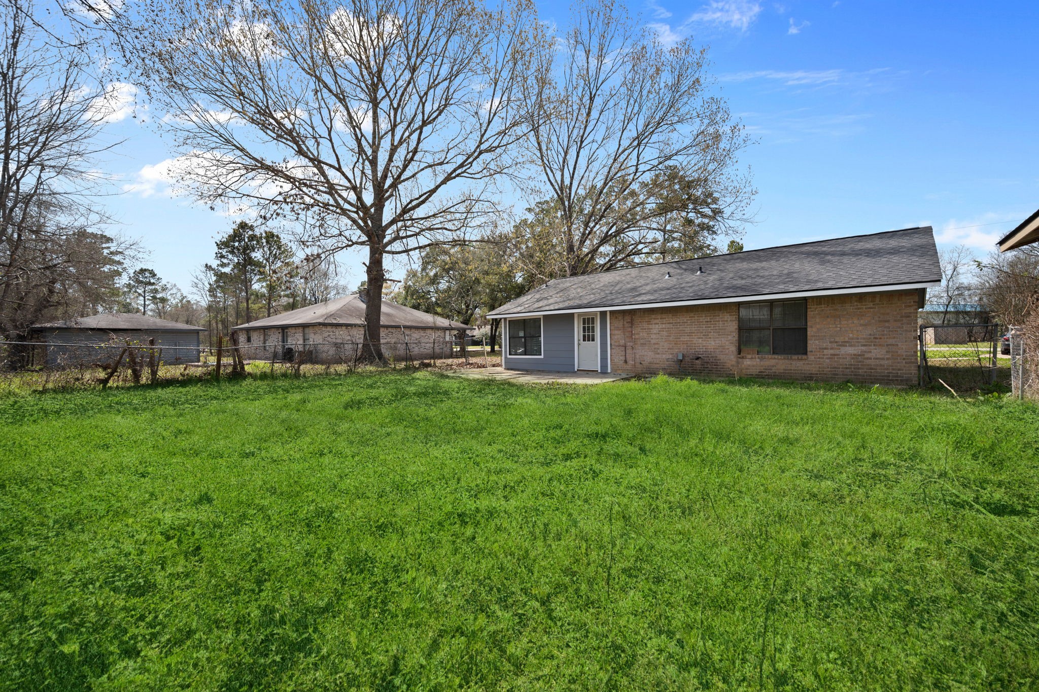61 Beeson Avenue Shepherd, TX 77371 - Photo 3 of 14 a view of a house with a yard and sitting area