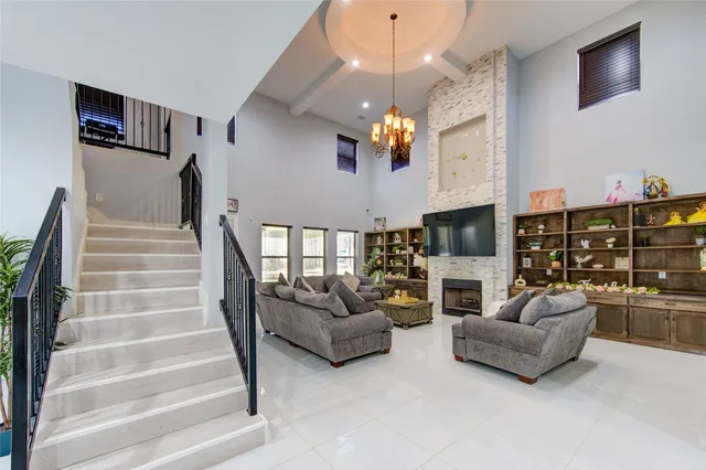 a view of living room with furniture and flat screen tv