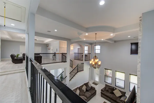 a kitchen with a refrigerator and cabinets