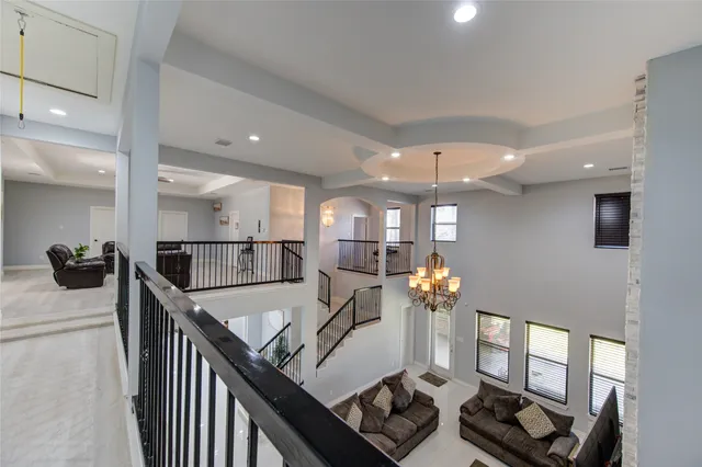 a kitchen with a refrigerator and cabinets