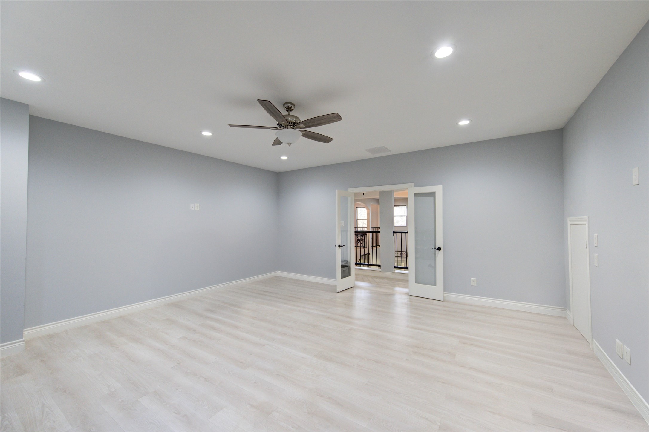 25324 Ravencrest Drive Porter, TX 77365 - Photo 34 of 39 a view of an empty room with window and wooden floor