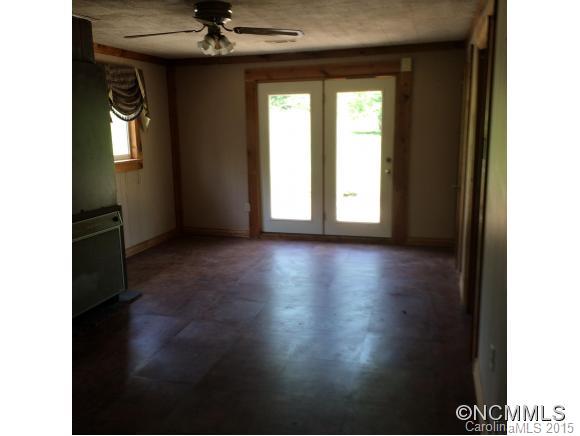 192 Green Waters Road Rutherfordton, NC 28139 - Photo 11 of 22 a view of an empty room with a window