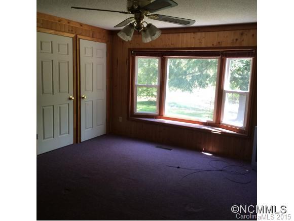 192 Green Waters Road Rutherfordton, NC 28139 - Photo 20 of 22 a black and white photo of a living room