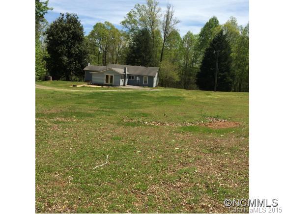 192 Green Waters Road Rutherfordton, NC 28139 - Photo 6 of 22 a view of a house with a yard