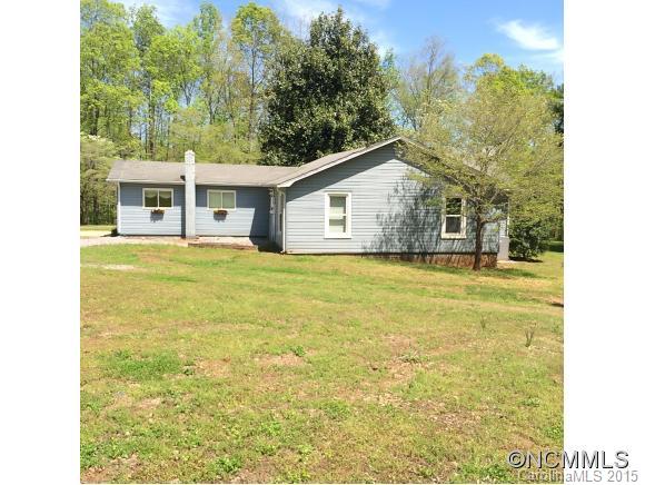 192 Green Waters Road Rutherfordton, NC 28139 - Photo 7 of 22 a view of a house with a yard and large trees