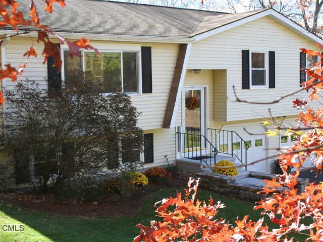 16 Molsick Road Seymour, CT 06483 - Photo 1 of 1 front view of house with a yard