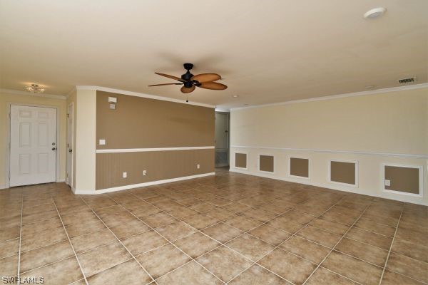 8180 Liriope Loop Lehigh Acres, FL 33972 - Photo 15 of 34 a view of a livingroom with a staircase