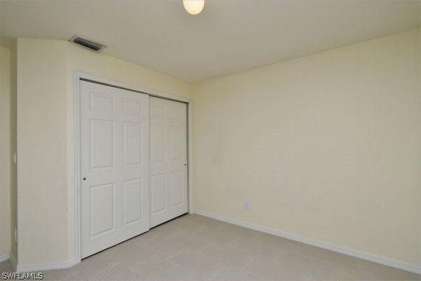 8180 Liriope Loop Lehigh Acres, FL 33972 - Photo 24 of 34 a view of an empty room