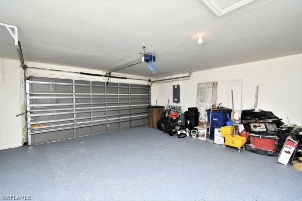 8180 Liriope Loop Lehigh Acres, FL 33972 - Photo 27 of 34 a view of a room with gym equipment