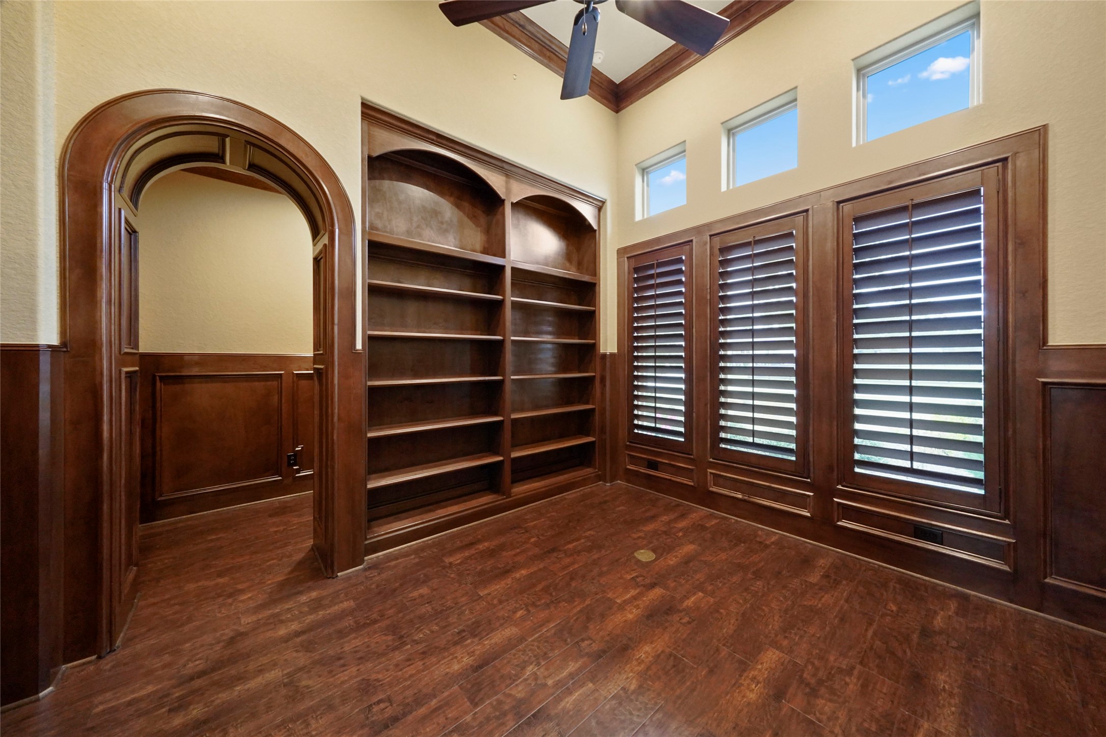 18 Rugged Lark Circle Tomball, TX 77377 - Photo 8 of 50 Custom built ins, secondary desk or printer area located just adjacent to the office , as well as a large storage closet complete this office as a perfect work space. Natural light upper windows are located throughout this home.