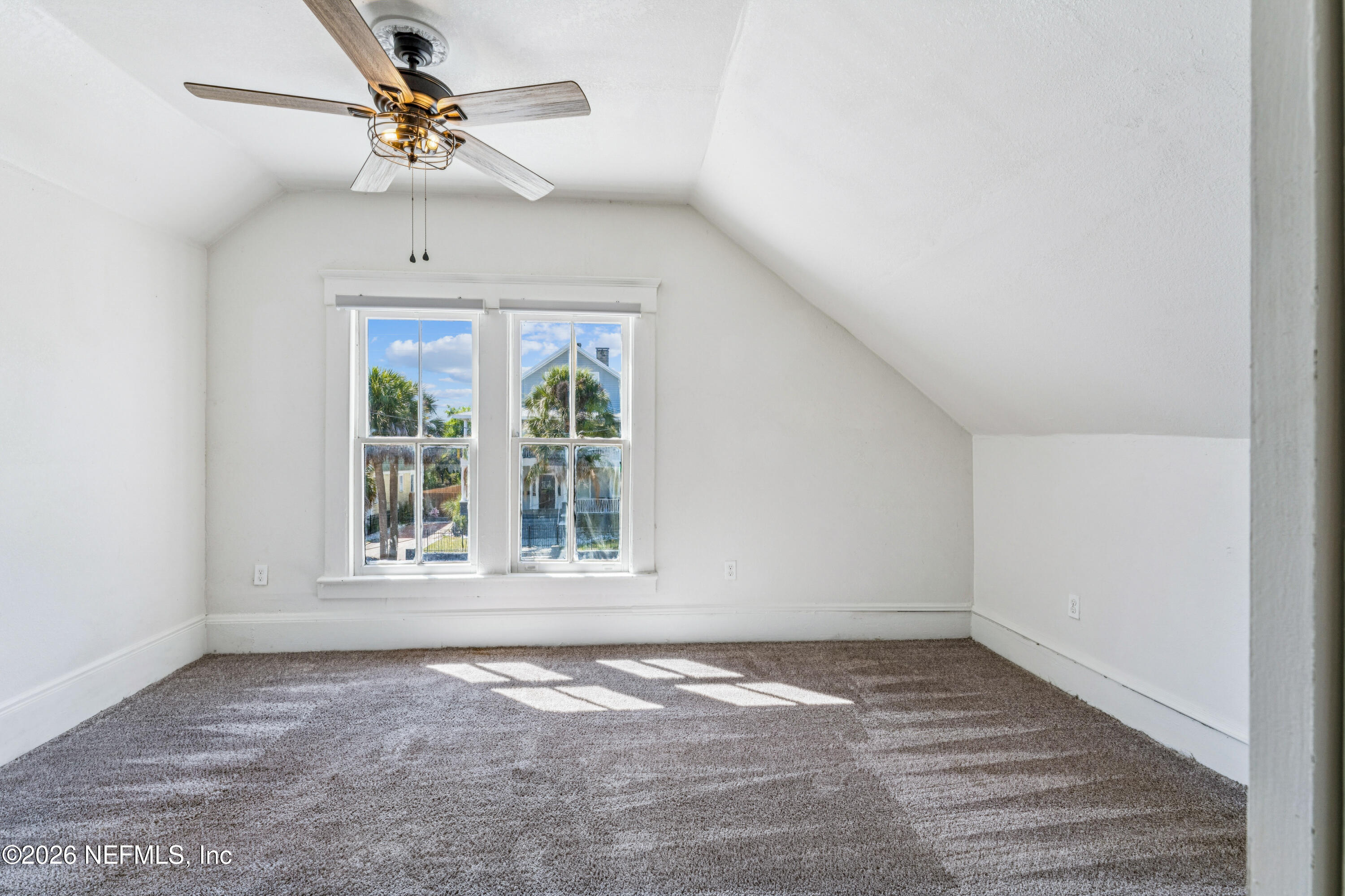 1625 Perry Street Jacksonville, FL 32206 - Photo 17 of 36 an empty room with a window and a ceiling fan