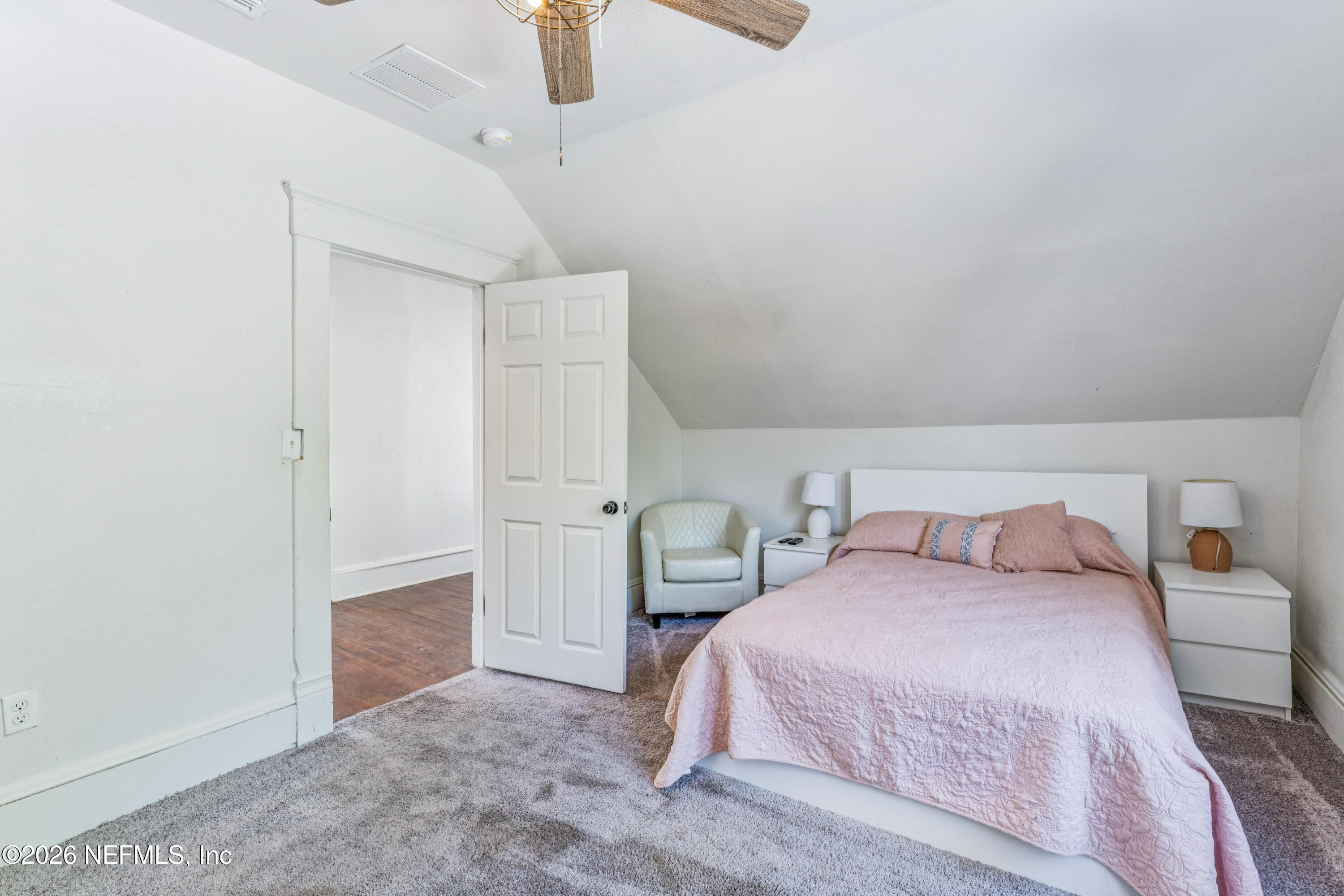 1625 Perry Street Jacksonville, FL 32206 - Photo 20 of 36 a bedroom with a bed and ceiling fan