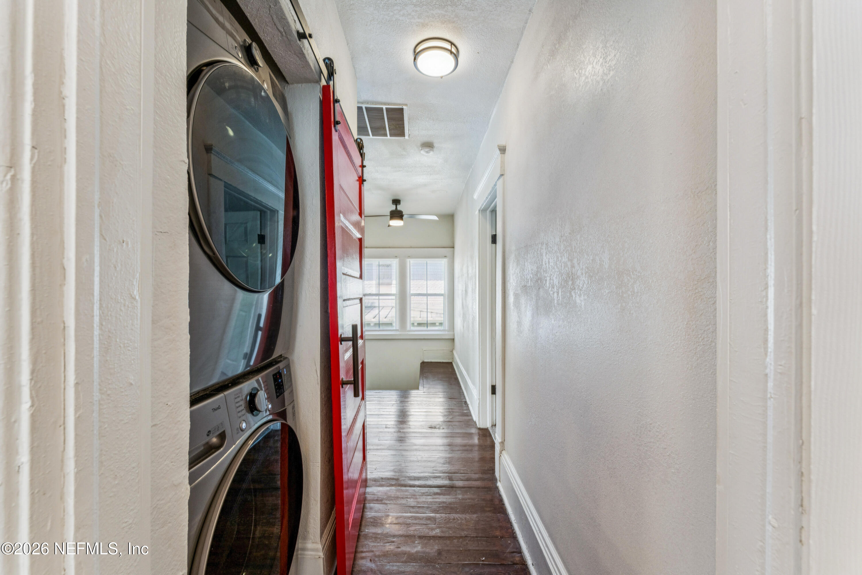 1625 Perry Street Jacksonville, FL 32206 - Photo 24 of 36 a view of a hallway with washer and dryer