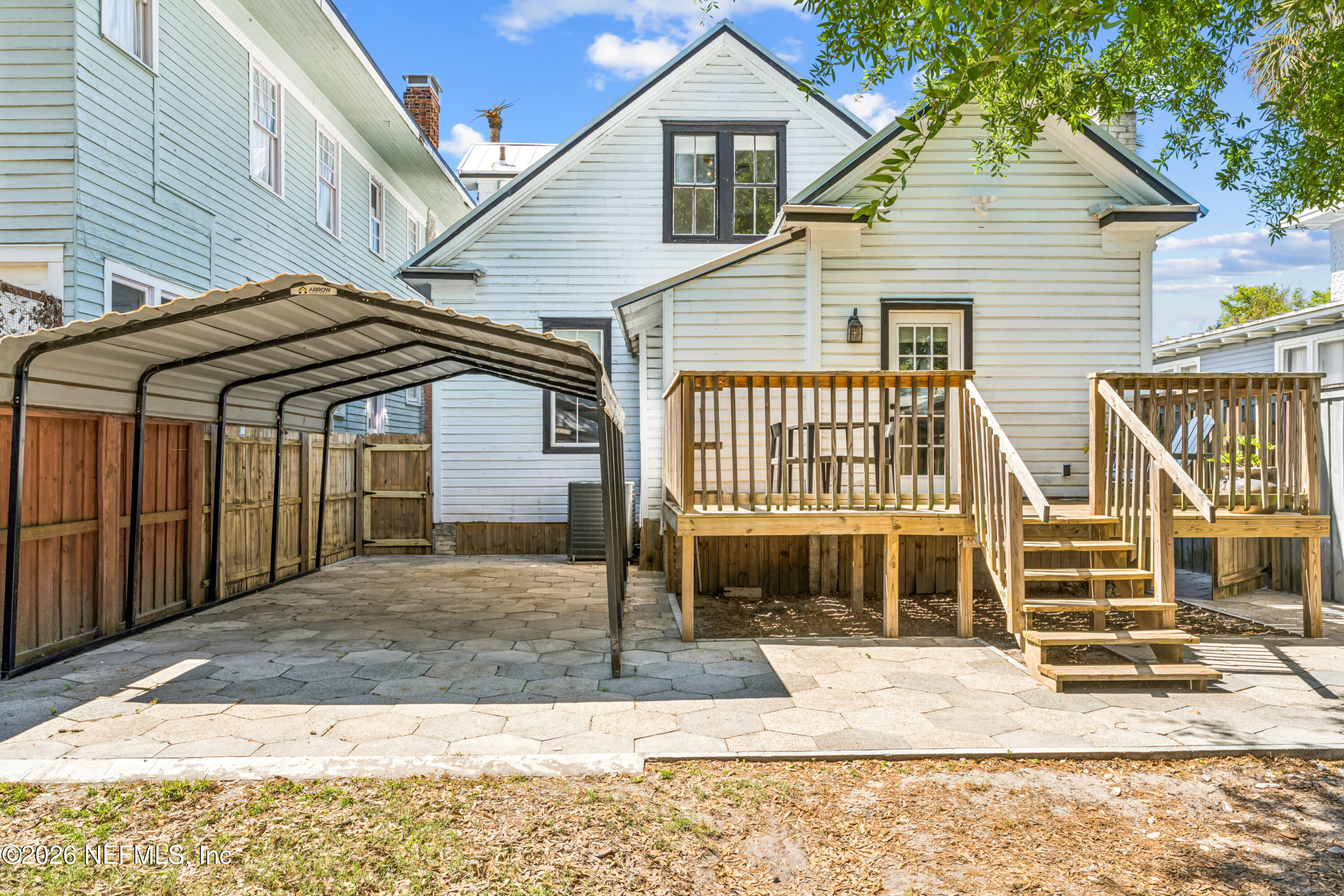 1625 Perry Street Jacksonville, FL 32206 - Photo 25 of 36 a front view of a house with a yard and garage