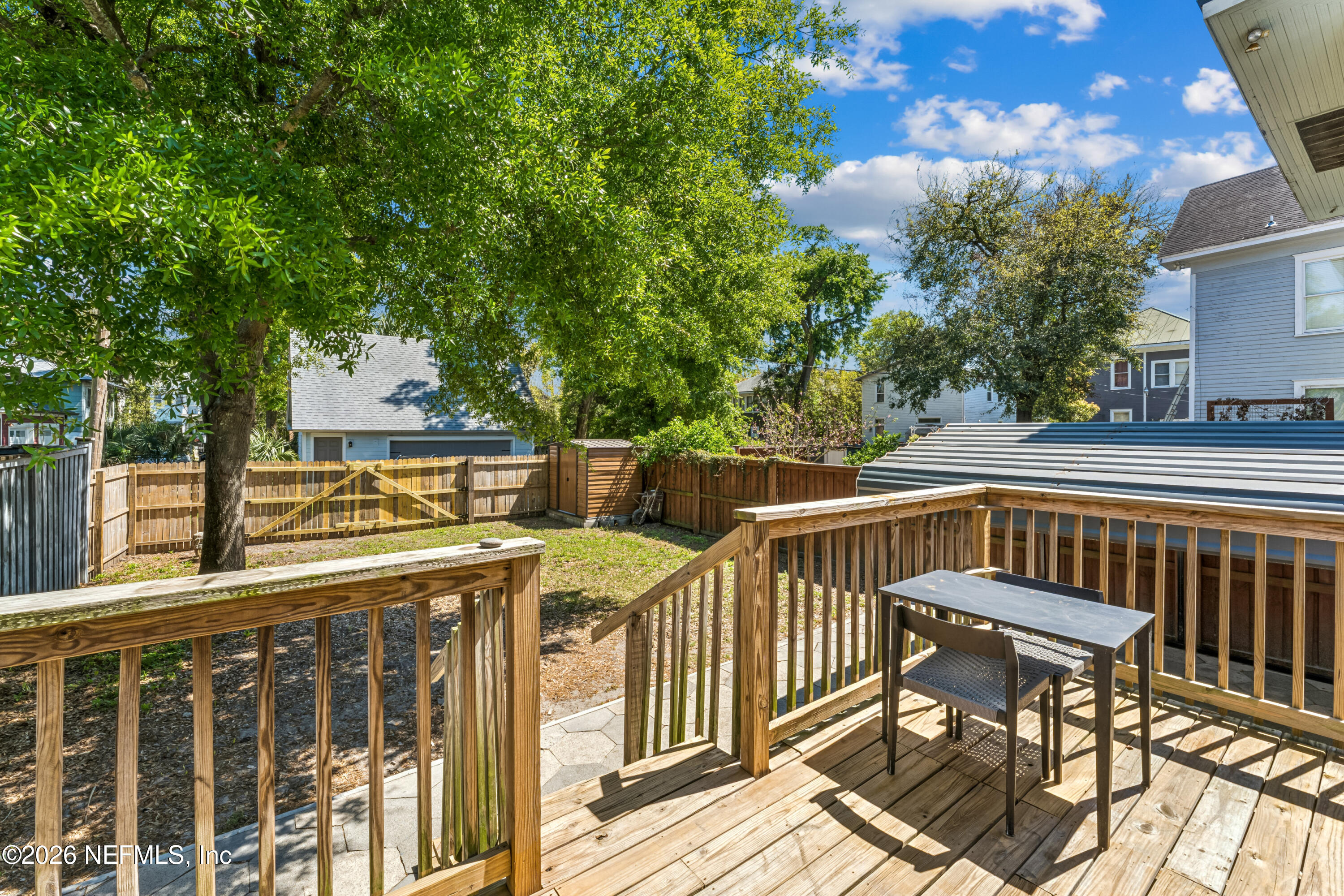 1625 Perry Street Jacksonville, FL 32206 - Photo 28 of 36 a view of a chairs and table on the deck