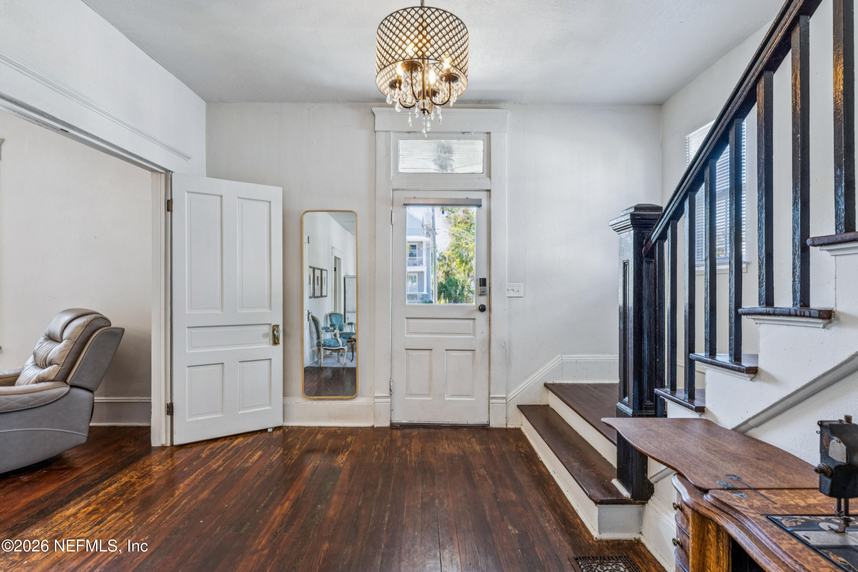 1625 Perry Street Jacksonville, FL 32206 - Photo 6 of 36 a view of a hallway with wooden floor windows and entryway