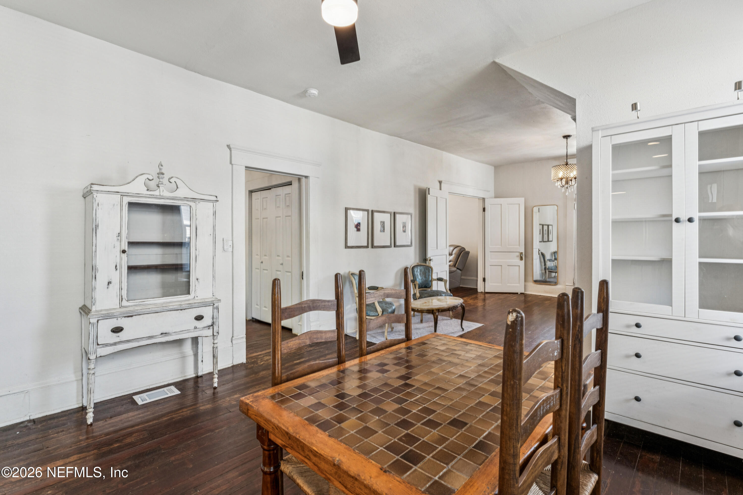 1625 Perry Street Jacksonville, FL 32206 - Photo 8 of 36 a living room with furniture a dining table and with wooden floor