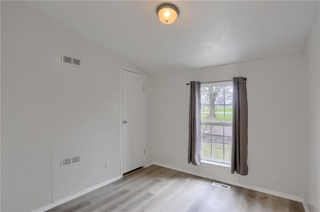 140 McCaslin Road New Castle, PA 16101 - Photo 18 of 28 an empty room with windows