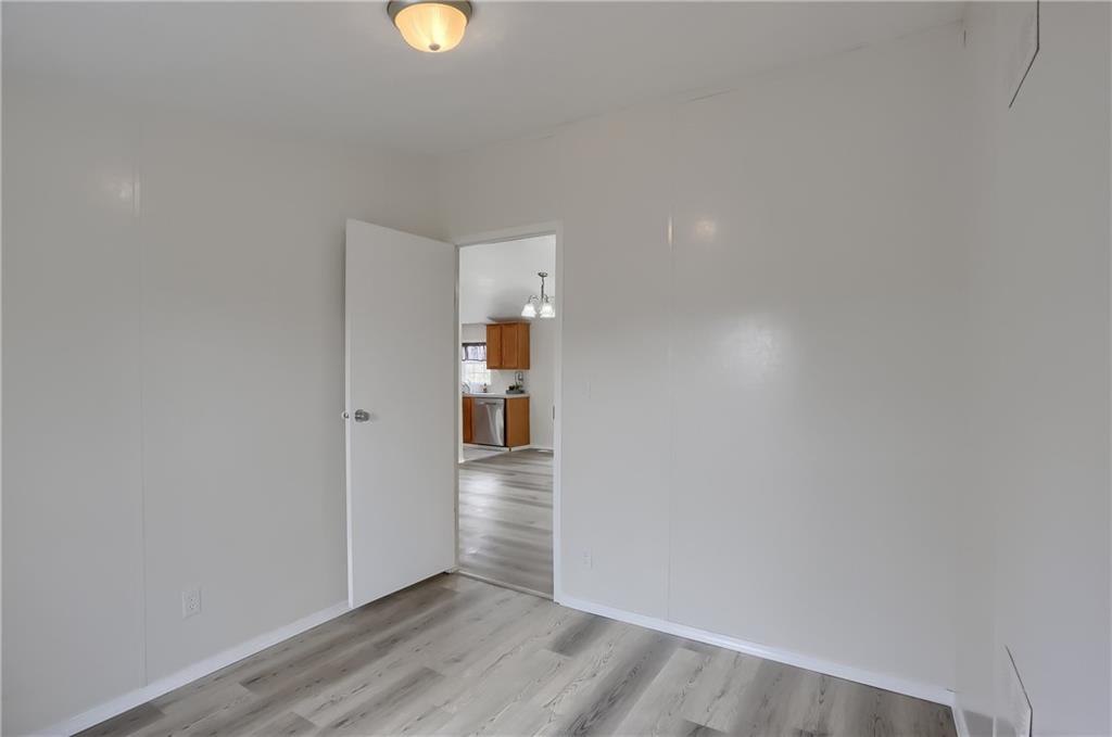 140 McCaslin Road New Castle, PA 16101 - Photo 19 of 28 a view of a room with wooden floor