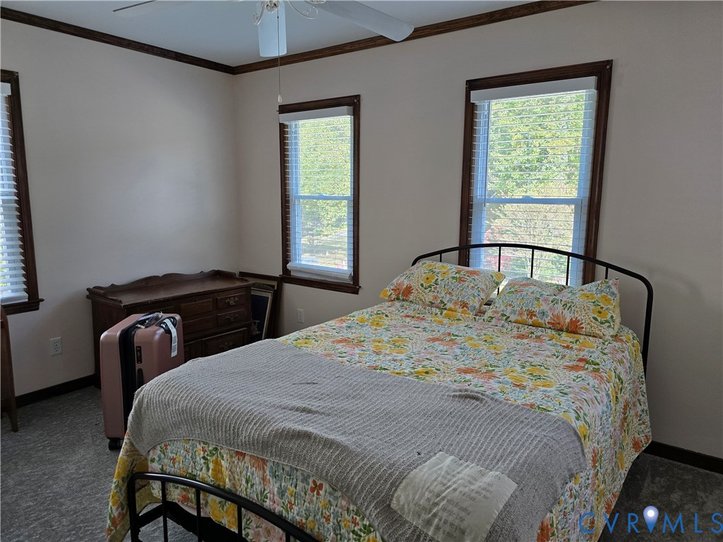 13305 Pointer Ridge Terrace Midlothian, VA 23112 - Photo 12 of 24 a bedroom with a bed and a window