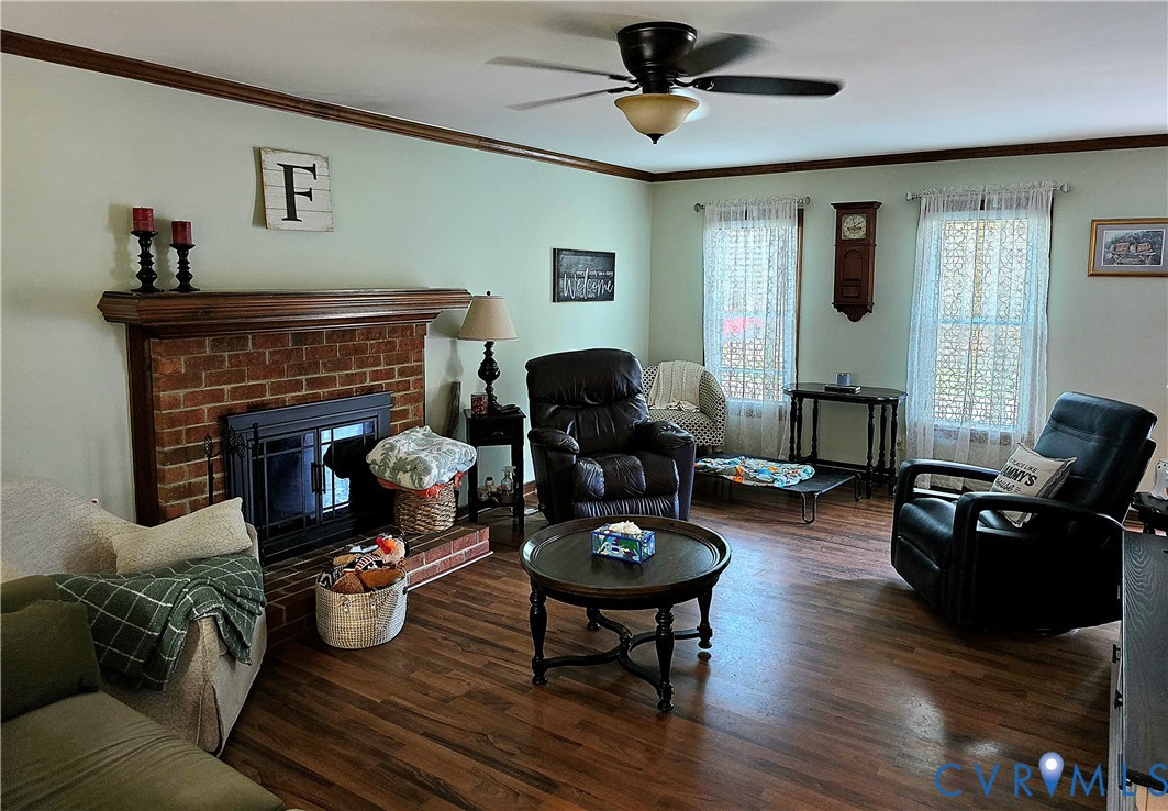 13305 Pointer Ridge Terrace Midlothian, VA 23112 - Photo 2 of 24 a living room with furniture and a fireplace