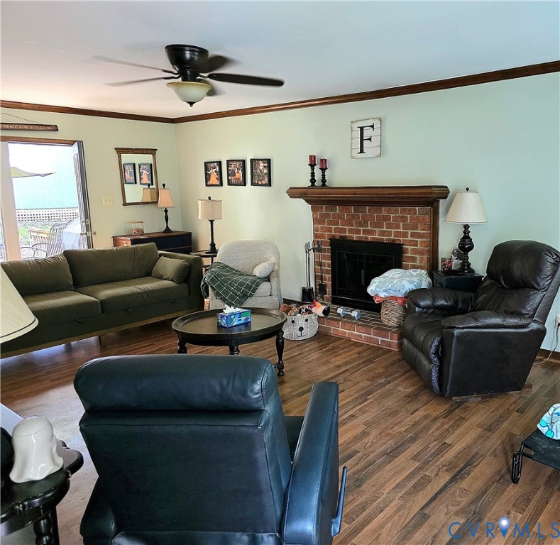13305 Pointer Ridge Terrace Midlothian, VA 23112 - Photo 3 of 24 a living room with furniture and a fireplace