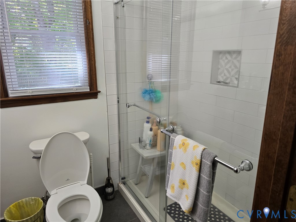13305 Pointer Ridge Terrace Midlothian, VA 23112 - Photo 10 of 24 a bathroom with a toilet and a sink