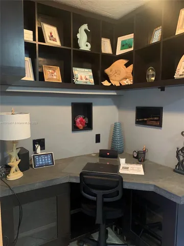 a room with a table and chairs