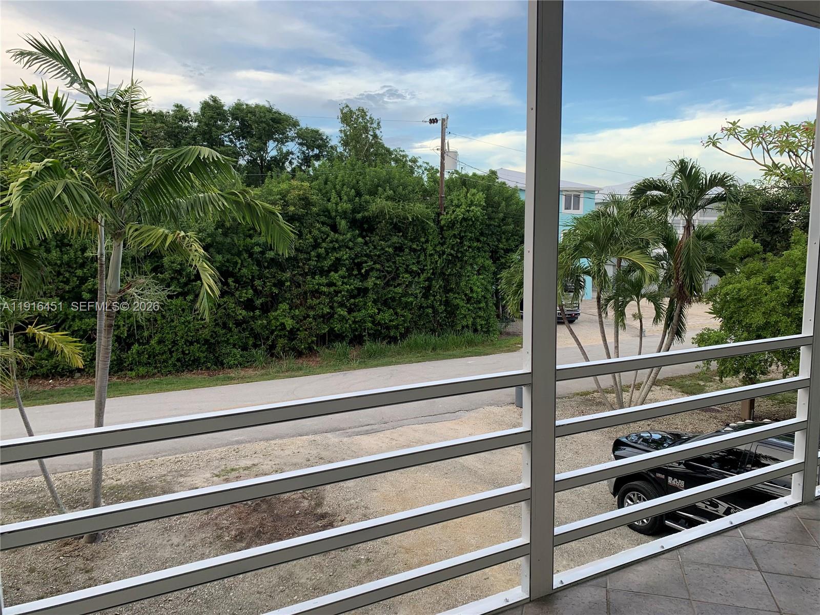 63 Bass Avenue, Unit 2 Key Largo, FL 33037 - Photo 9 of 24 a view of a balcony