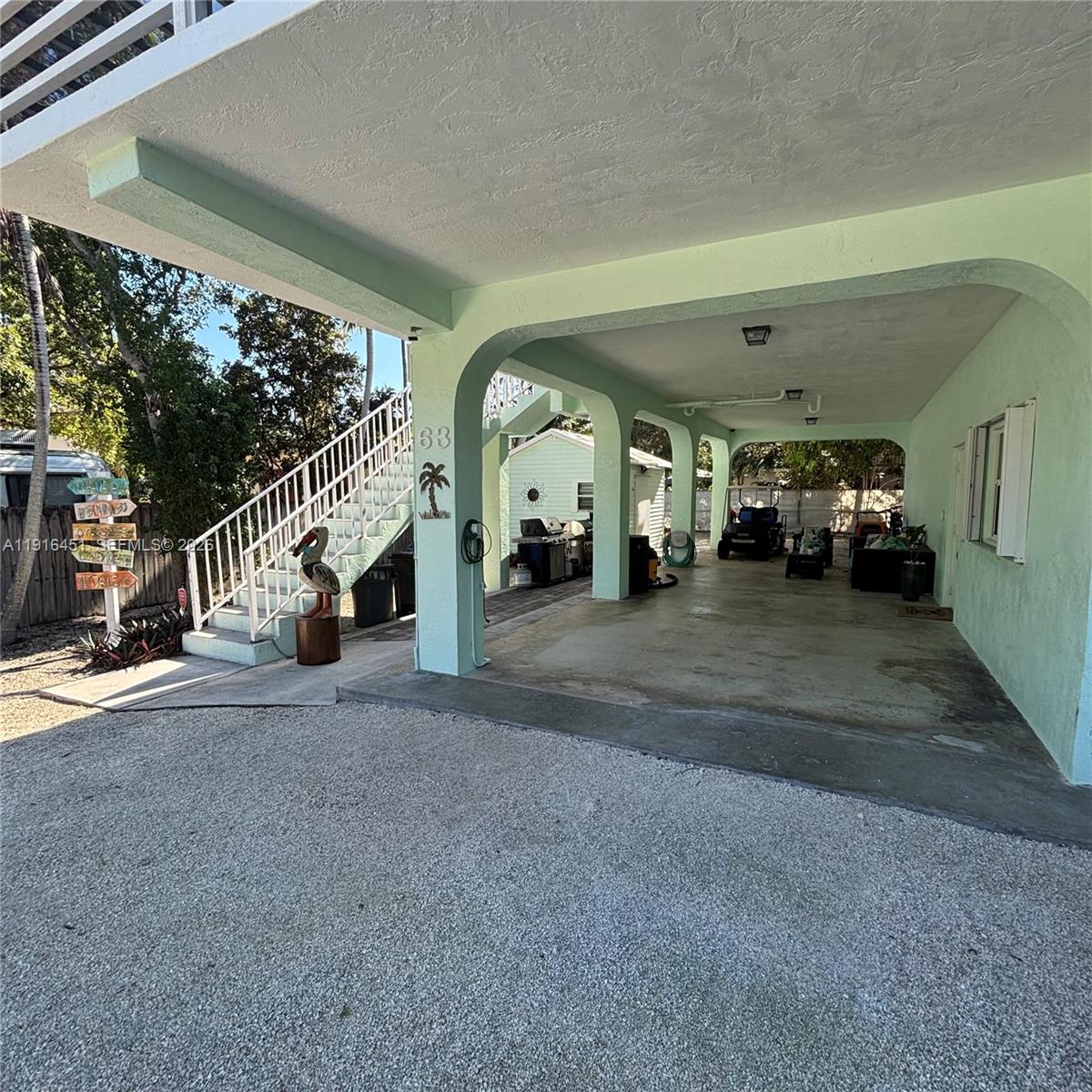63 Bass Avenue, Unit 2 Key Largo, FL 33037 - Photo 10 of 24 a view of a car garage