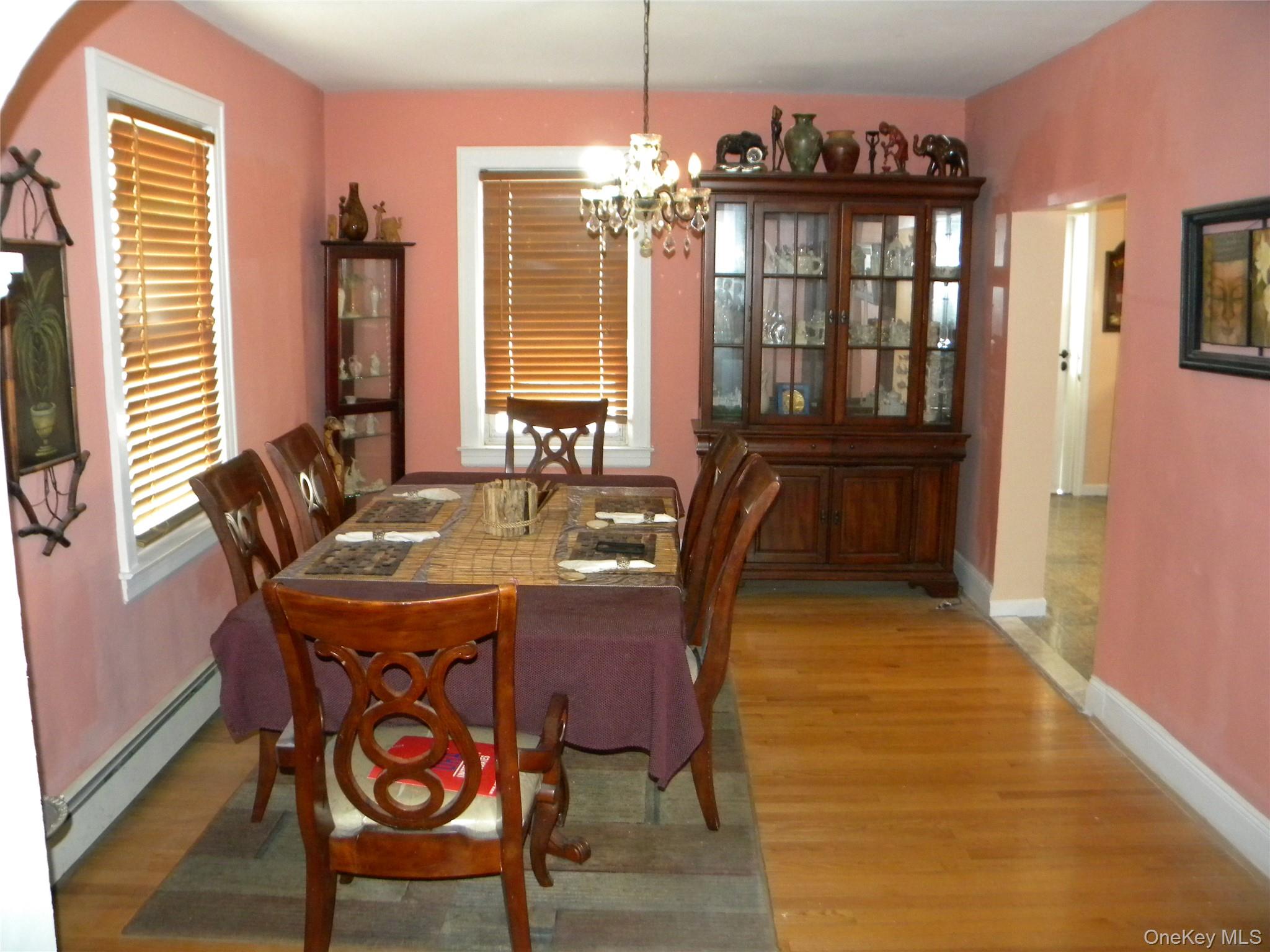 241-26 86th Road Queens, NY 11426 - Photo 7 of 38 a dining room with furniture and window