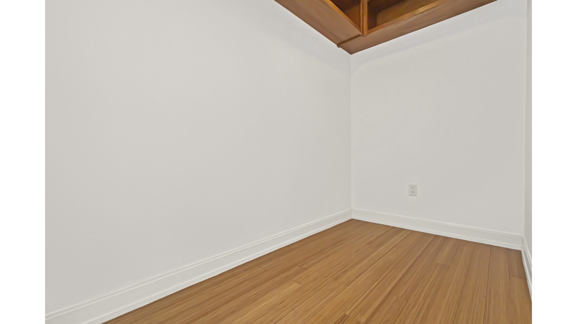340 East Randolph Street, Unit 404 Chicago, IL 60601 - Photo 11 of 20 a view of a room with wooden floor