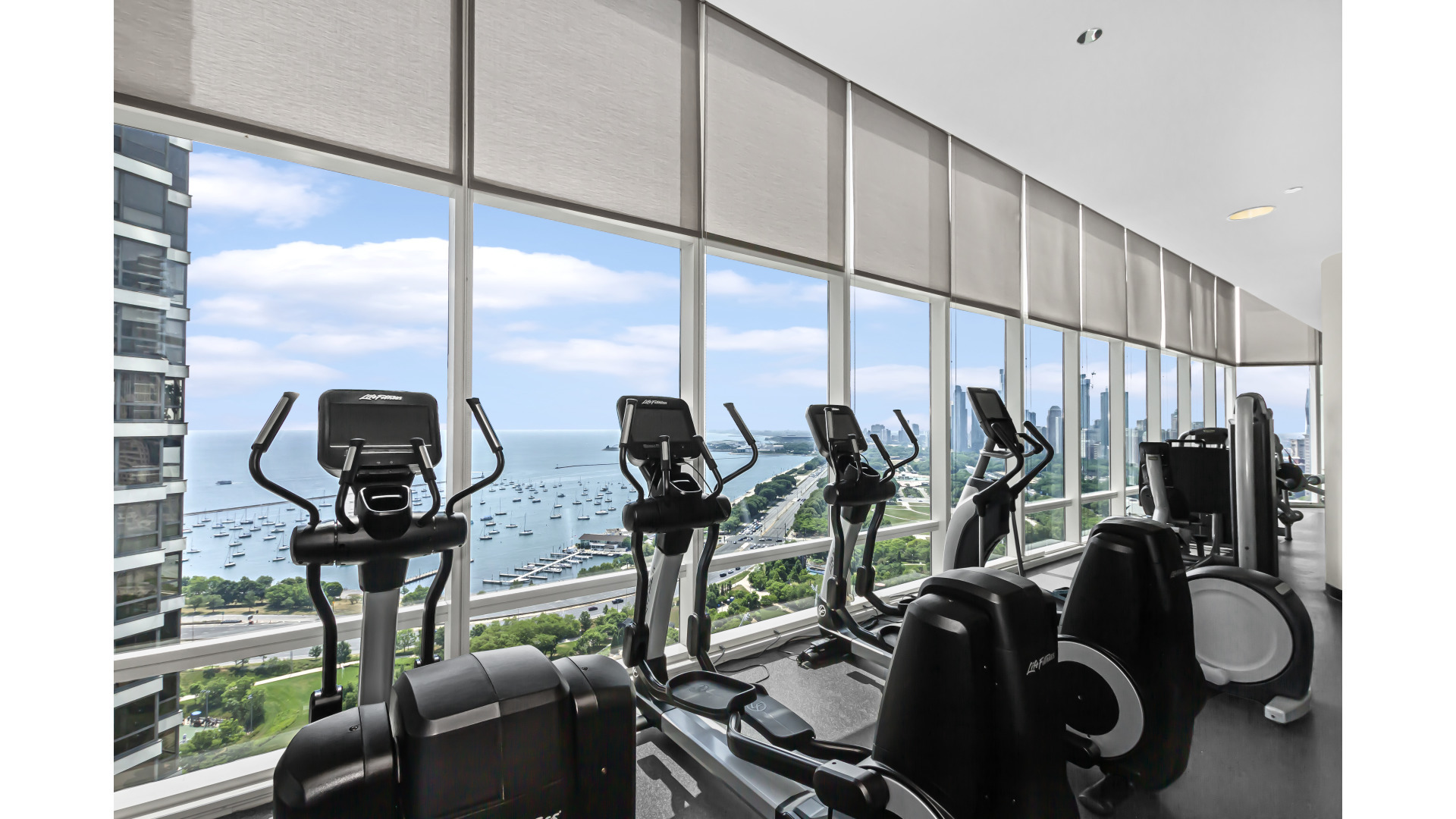 340 East Randolph Street, Unit 404 Chicago, IL 60601 - Photo 19 of 20 a view of a room with gym equipment