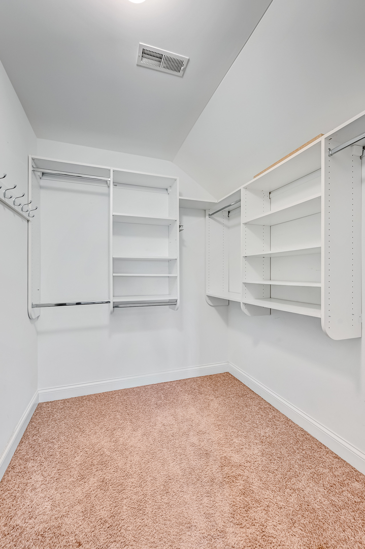 14951 South Preserve Drive Lockport, IL 60441 - Photo 18 of 25 a view of an empty walk in closet