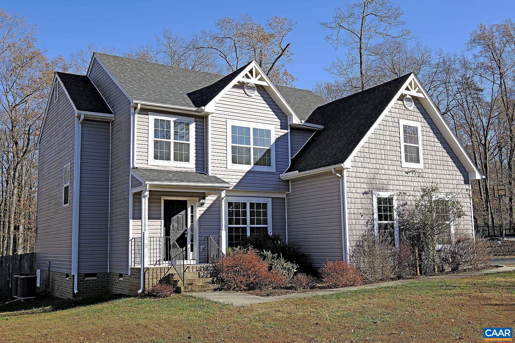 115 Reedy Creek Road Louisa, VA 23093 - Photo 1 of 17 a front view of a house with a yard