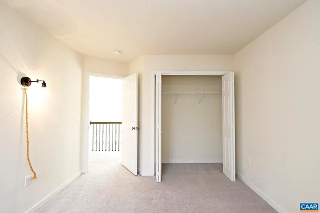 a view of a room with a hallway