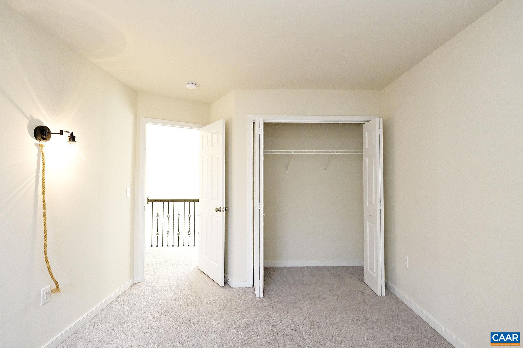 115 Reedy Creek Road Louisa, VA 23093 - Photo 13 of 17 a view of a room with a hallway