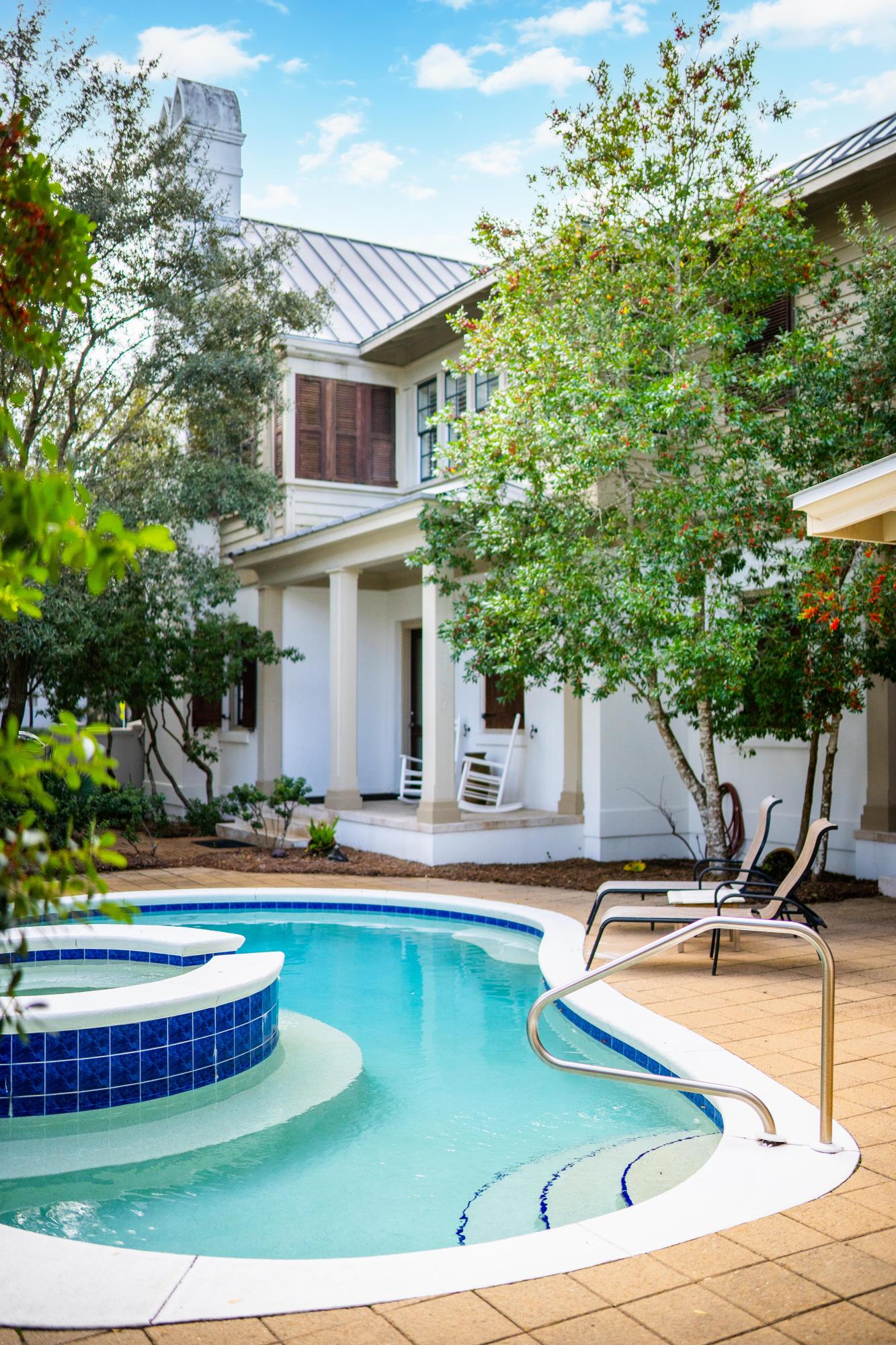 113 East Long Green Road Rosemary Beach, FL 32461 - Photo 3 of 54 a view of a house with swimming pool and sitting area