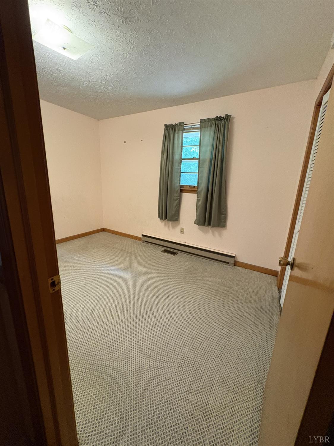 1796 Owens Mill Road Gretna, VA 24557 - Photo 12 of 20 a view of a room with window