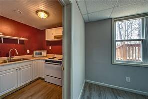 2234 Oak Falls Lane Buford, GA 30519 - Photo 19 of 23 a kitchen with a sink cabinets and window