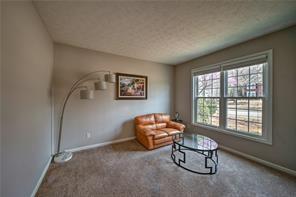 2234 Oak Falls Lane Buford, GA 30519 - Photo 3 of 23 a living room with furniture and a window