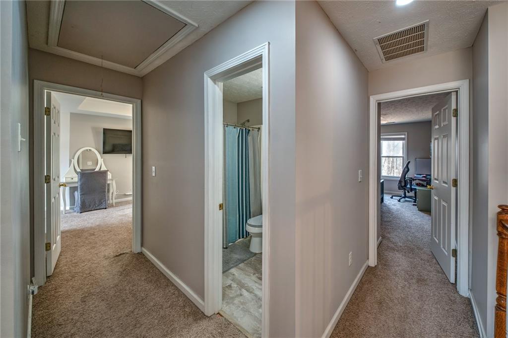 2234 Oak Falls Lane Buford, GA 30519 - Photo 10 of 23 a view of a livingroom from a hallway